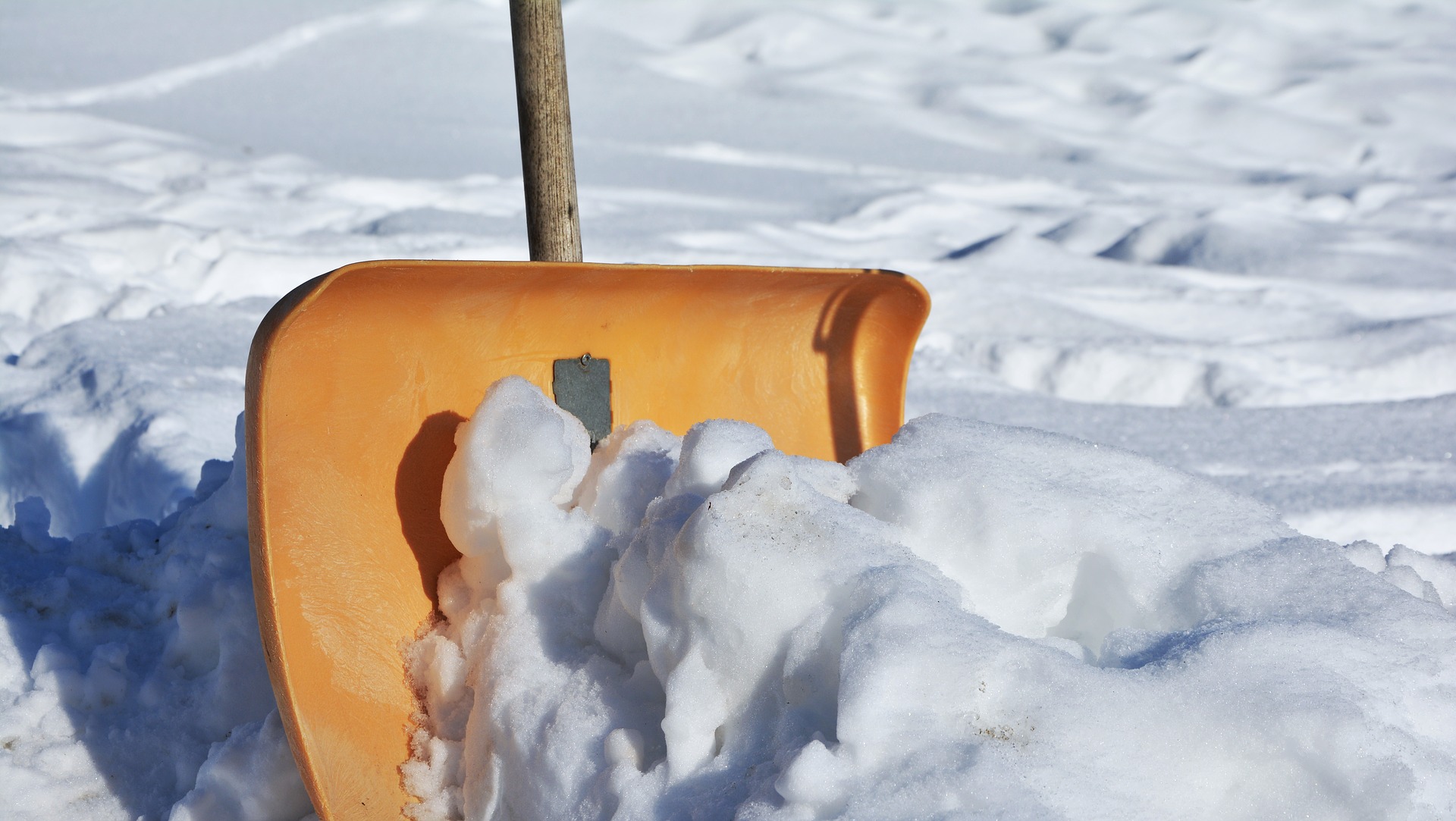 how to shovel snow safely